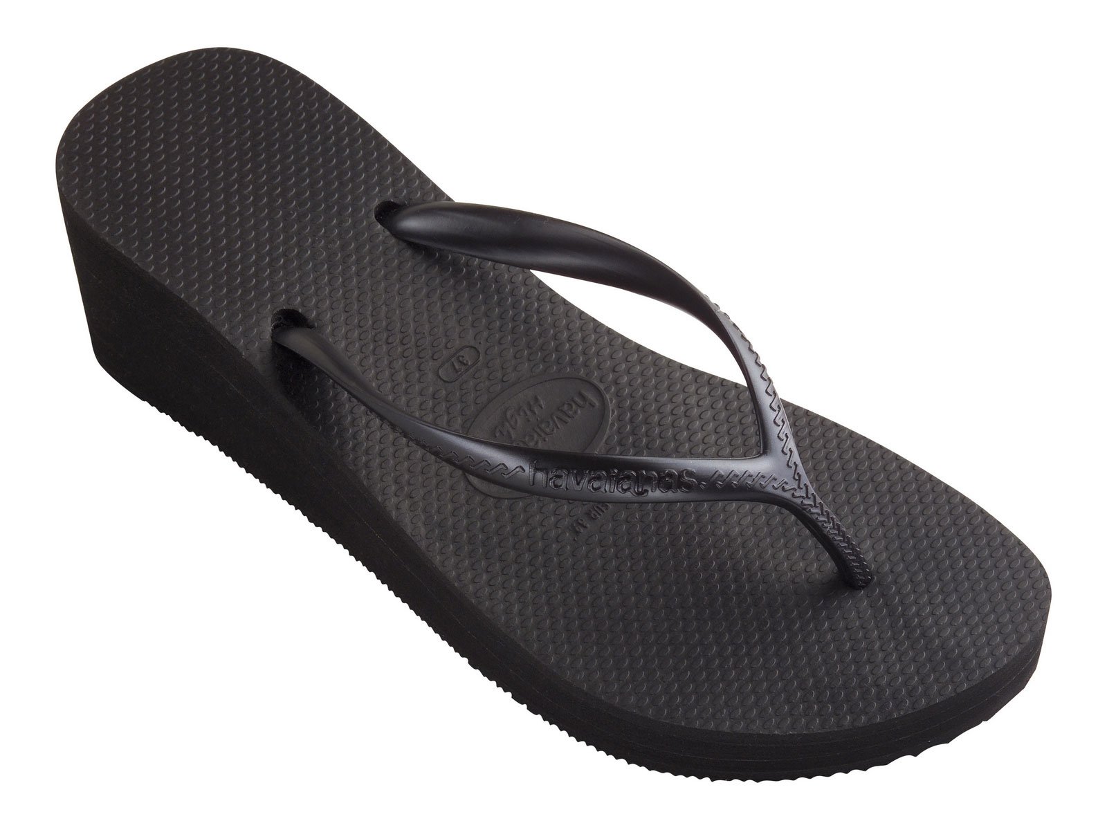 ... backless black thongs from Havaianas have a fashionable wedge heel