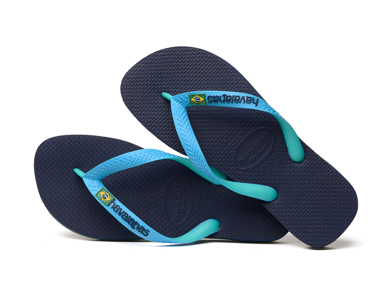 Two-toned Flip Flops Featuring A Navy Blue Footbed And Turquoise Straps ...